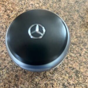 Mercedes-Benz Black and Silver Car Audio Knob